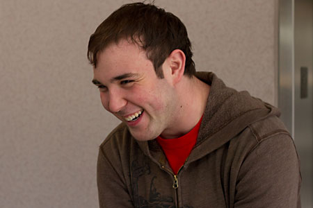 Young Adult Council member Ben Palmer leads an artistic discussion for his peers